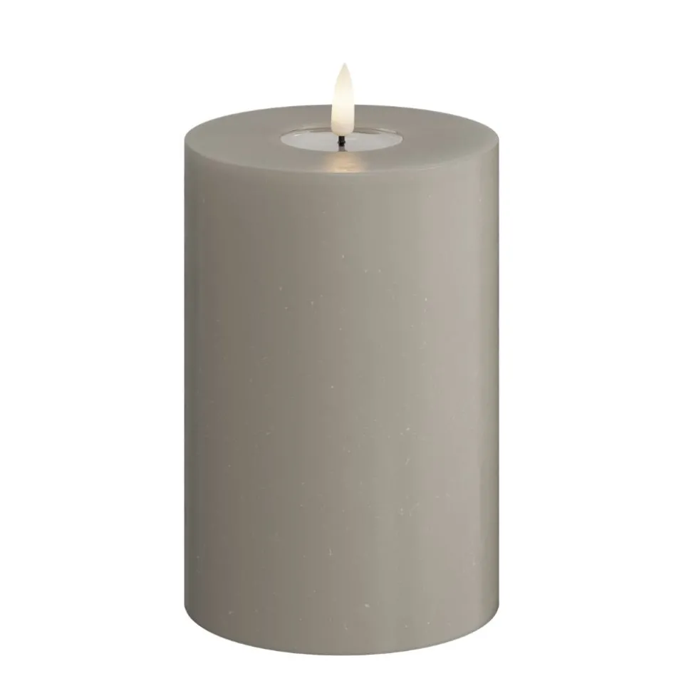 deluxe_led_stumpenkerze_s_SKUwms4TPUk9i_0.webp DELUXE LED Stumpenkerze Sandfarben 10 x 15 cm