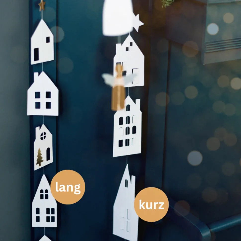 rder_huschenkette_winters_SKUmsoUYQ45MH_1.webp Räder Häuschenkette Winterstadt Lang