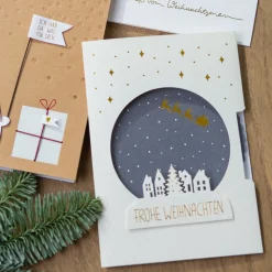 Räder Schneekugelkarte Frohe Weihnachten