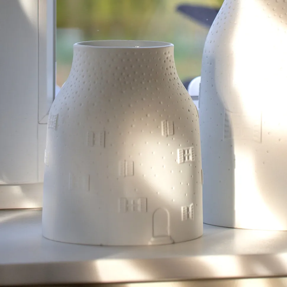 rder_vase_winterhaus_klei_SKUkueDtq8Pby_0.webp Räder Vase Winterhaus klein