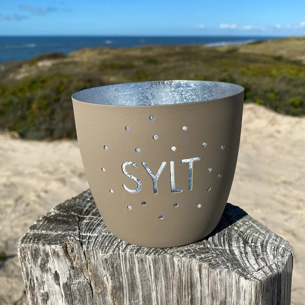 windlicht_im_exklusiven_s_SKUzV5O7m7aup_0.webp Windlicht im exklusiven Sylt Design Konfetti Beige Mittel